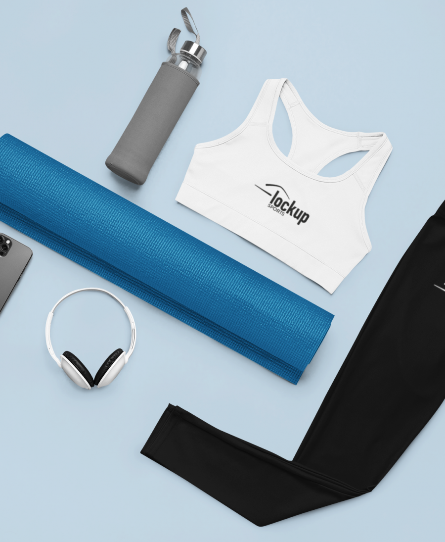 flat-lay-mockup-featuring-a-sports-bra-and-leggings-in-a-fitness-setting-m1200